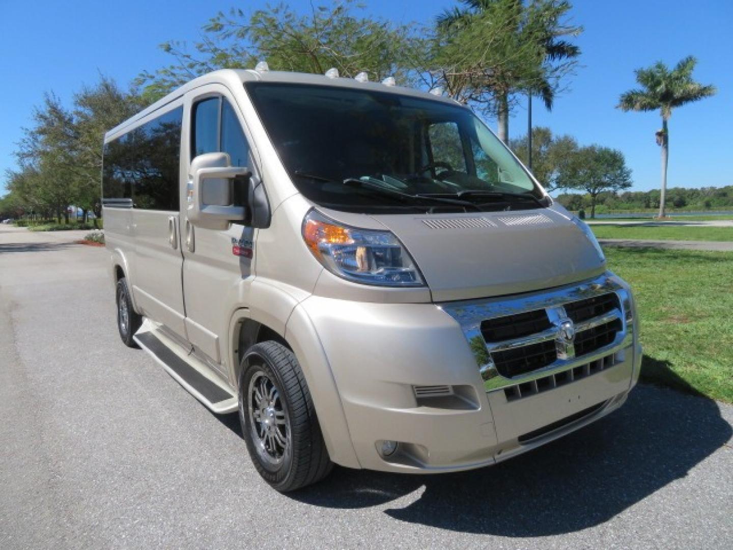 2016 Gold /Tan and Black Leather RAM Promaster (3C6TRVAG5GE) , located at 4301 Oak Circle #19, Boca Raton, FL, 33431, (954) 561-2499, 26.388861, -80.084038 - You are looking at a Gorgeous 2016 Ram Promaster Tempest X Handicap Wheelchair Conversion Van with 30K Original Miles, Lowered Floor, Dual Side Entry Doors, Power Passenger Side Entry Door, 750lb Braunability Wheelchair Lift, 4 Passenger Rear Power Bench Seat/Bed, Navigation, Rear Entertainment, Sur - Photo#9